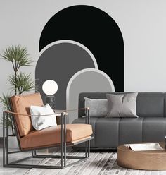 a modern living room with black and white walls