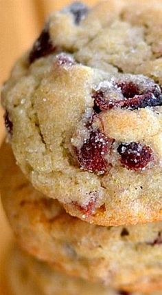 three cranberry cookies stacked on top of each other