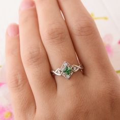 "Vintage style 925 sterling silver art deco emerald promise ring for her, Unique geometric celtic style womens emerald engagement ring WE OFFER UNLIMITED PERIOD INSTALLMENTS PLAN This is a beautiful, stunning, feminine ring that works well for all occasions, styles, and ages. You will love it! Ring information Main stone: Emerald Approximate size: 4x4mm Accent stones: White cubic zirconia Approximate size: 1.5mm (4 stones) Metal type: Silver Metal stamp: 925 Sterling SIlver Customization / Repla Exquisite Silver Emerald Jewelry, Wedding Emerald Ring In 14k White Gold, Silver Diamond Cut Emerald Cut Jewelry, Silver Emerald Cut Diamond Cut Jewelry, Emerald Cut Diamond Cut Silver Jewelry, Diamond White Birthstone Jewelry For Promise, Diamond White Jewelry With Birthstone For Promise, Promise White Gold Emerald Cut Jewelry, White Gold Emerald Cut Promise Jewelry