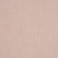 a plain pink fabric textured with thin lines and dots on an off - white background