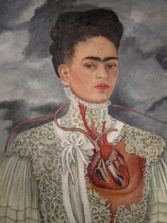 a poster with an image of a woman holding a heart