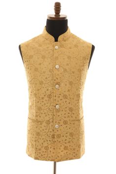 Our Beige Nehru Jacket with Gold Sequins and Thread Work is a reflection of your impeccable taste and appreciation for quality craftsmanship. Make a lasting impression at any event with this exquisite piece that marries tradition with contemporary style. Don't miss the opportunity to own this timeless piece of clothing that will be the envy of all your friends and family. Elevate your fashion game and embrace the blend of tradition and modernity with our Beige Nehru Jacket. Order yours today and let your style shine! Exceptional quality is promised. Key Features: Rich Beige Elegance: The soft, beige hue of this Nehru jacket adds a touch of understated class to any ensemble. Its neutral shade makes it a versatile choice for various occasions. Intricate Gold Sequins: The jacket is adorned wi Beige Nehru Jacket For Festive Transitional Season, Traditional Beige Nehru Jacket For Transitional Season, Gold Nehru Jacket For Designer Wear In Transitional Season, Gold Nehru Jacket For Designer Wear During Transitional Season, Festive Beige Nehru Jacket For Festivals, Gold Bollywood Nehru Jacket For Transitional Season, Gold Nehru Jacket With Cutdana For Festivals, Gold Brocade Nehru Jacket For Transitional Season, Gold Nehru Jacket For Festive Transitional Season