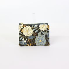 Explore the practicality of our Dawn Garden Coin Pouch, a compact solution for your coins and small items. This coin pouch combines style and functionality, making it a perfect mini wallet or accessory holder. The unique design adds a sophisticated touch to your daily routine. Imagine easily finding your small essentials in this stylish pouch. Order now and keep your belongings neatly organized! Versatile Pouch Coin Purse For Gift, Versatile Coin Purse With Removable Pouch As Gift, Versatile Pouch Wallet For Gift, Versatile Pouch Wallets As Gift, Versatile Pouch Wallets As Gifts, Versatile Compact Pouch As Gift, Versatile Rectangular Coin Purse For Gifts, Versatile Rectangular Coin Purse As Gift, Coin Purse With Interior Card Slots