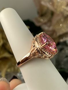 Pink Cubic Zirconia Rose Gold Plated Ring Orb Design#82 Custom Made This is a brand new Victorian inspired solid sterling silver rose gold plated filigree ring. This stunning ring is set with a 6ct Simulated/Man-made pink cz gemstone. The round cut pink cz is 13mm (1/2th of an inch) in diameter. The inside of the band is marked 925 for sterling. Notice the beautiful intricate floral prong design and swirls of the silver filigree setting and band. This is a lovely new, well made, and charming rin Victorian Filigree, Rose Gold Plated Ring, Luxury Rings, Ring Rose Gold, Filigree Ring, Cz Ring, Plated Ring, Gold Plated Rings, Engraved Items