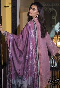 Designer Lawn Dress for Eid 2020 with beautiful print and embroidered organza patch. Buy Online Asim Jofa new collection at this store and change your look. Shirt: Elegant Shirt in lilac color is embellished with fully embroidered. Shirt neckline is decor with thin embroidered patch and gheerah is also embellished with embroidered border. Shirt is sleeveless. Trouser: Beautiful dyed trouser in matching color is added to this dress which is giving a complete look to dress. Dupatta: Designer Lawn Dress For Eid, Suits Pakistani, Lawn Design, Shirt Elegant, Asim Jofa, Lawn Dress, Pakistani Salwar Kameez, Eid Dresses, Embroidered Organza