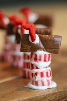 some candy bars are stacked on top of each other in the shape of santa's hat