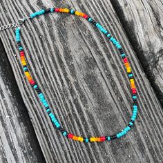 "ONE \"Layne\" Beaded Choker in 16\", 14\" or 12\" length This hand-beaded choker is a perfect addition to any punchy outfit. Perfect for rodeo days. The pattern features turquoise and a serape/ sunset pattern. Includes an extension chain to ensure it fits most neck sizes comfortably. If you would like a different length, please message me! I would love to help you design your perfect necklace. I am more than happy to customize any order. Please feel free to ask me any questions and/or concerns Native American Seed Bead Patterns, Western Chokers, Western Beaded Necklace, Western Shopping, Choker Ideas, Beaded Chocker, Diy Necklace Making, Western Necklaces, Beaded Jewelry Necklaces