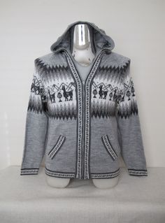 Alpaca Blend Hoodie Cardigan (UNISEX) This sweater is so perfect, is unique and stylish! This garment is smooth and light and will keep you warm on cold winter days. This unique cardigan features a casual Andean llamas design with bright colors and will go with just about everything. You will look great in our cardigan jacket and you will get complimented every time your wear it. It is the perfect gift Material: Alpaca Wool is hypoallergenic, light and warm. Its fibers contain microscopic air ba Unique Cardigan, Mens Pullover, Pullover Sweater Men, Hoodie Cardigan, Unisex Sweater, Winter Days, Zipper Jacket, Alpaca Wool, Pullover Men