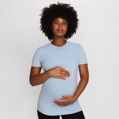 From bump to beyond, this sleek, sweat-wicking top is ready for whatever you are. Unbelievably soft, lightweight fabric has plenty of stretch but recovers its shape for comfort well past the third (or let's be real, the fourth) trimester. Casual Stretch Bump Friendly Tops, Casual Stretch Tops Bump Friendly, Maternity Bump Friendly Relaxed Fit Tops, Stretchy Bump-friendly Everyday Tops, Maternity Relaxed Fit Crew Neck Top, Nursing Friendly Fitted Short Sleeve Tops, Nursing Friendly Crew Neck Maternity Tops, Nursing Friendly Maternity Top With Crew Neck, Nursing-friendly Fitted Top With Short Sleeves