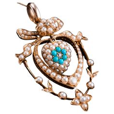 We are delighted to offer this spectacular antique Edwardian 15ct gold turquoise, diamond and pearl pendant necklace made c.1910. Apparent upon a quick glance, this pendant presents an exquisite & elegant bow and heart-shaped Edwardian design that is unlike any modern/contemporary pieces. Impressive fine gold mounts and ornate curved borders are complemented by seed pearls that taper in size and have been set meticulously. This particular example features some of the most desirable and finest tr Edwardian Design, Edwardian Jewelry, Velvet Interiors, Puffy Heart, Pearl Pendant Necklace, Seed Pearl, December Birthstone, Pearl Pendant, Turquoise Stone