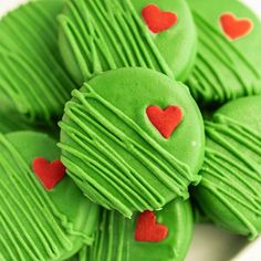 green cupcakes with red hearts on them