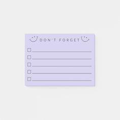 a purple post - it note that says don't forget