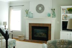 the living room is clean and ready for guests to use it as a focal point