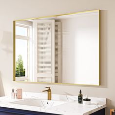 a bathroom sink with a large mirror above it