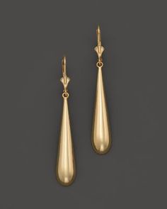 A traditional pair of teardrop earrings in 14K yellow gold, polished to a high shine. Formal Fine Jewelry Teardrop Earrings, Luxury Drop Earrings For Formal Occasions, Classic Pear-shaped Polished Earrings, Classic Teardrop Pendant Earrings For Formal Occasions, Classic Formal Teardrop Drop Earrings, Elegant Yellow Gold Drop With Polished Finish, Elegant Yellow Gold Drop Earrings, Classic Gold Drop Earrings, Classic Polished Drop Earrings