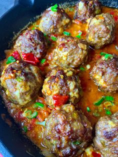 meatballs with tomato sauce in a skillet ready to be eaten and served for dinner