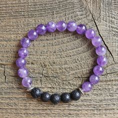 "This bracelet features beautiful amethyst gemstones, lava stones, and silver accent beads. Made with high quality elastic cord. Beads are 8mm, which is slightly larger than the size of a pea. *To use as a diffuser bracelet, apply a drop or two of 100% pure essential oil to the lava stones. The scent will last for 1-2 days. Please message me if you would like more information about essential oils. Amethyst Healing Properties: Protection, Cleansing, Intuition, Clears Negativity & Confusion *Custo Healing Bracelet With Gemstone Beads And Lava Stone, Healing Lava Stone Bracelets With Gemstone Beads, Spiritual Lava Stone Stretch Bracelet With Natural Stones, Purple Spiritual Bracelet For Everyday Wear, Spiritual Purple Bracelets For Everyday, Spiritual Purple Bracelet For Everyday Wear, Spiritual Purple Bracelet For Everyday, Meditation Bracelets With Natural Lava Stones, Spiritual Lava Stone Stretch Bracelet Gift