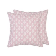 two pink pillows with white flowers on the front and back, both in different sizes