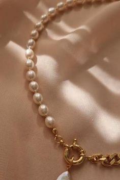 Elevate sophistication with our Baroque Pearl Necklace, featuring a delicate chain and pearl pendant secured with a chic toggle clasp. This dainty necklace, crafted with freshwater pearls, makes for the perfect anniversary gift for your wife. Celebrate love with timeless elegance! 💖✨ #BaroquePearlNecklace #AnniversaryGift #PearlPendant #DaintyJewelry #EleganceRedefined #FreshwaterPearls #ChicToggleClasp #TimelessBeauty #WifeAppreciation #JewelryGift #PearlAdornments Pearl Pendant Chain Necklace For Weddings, Pearl Chain Necklace With Pearl Pendant For Wedding, Pearl Chain Necklace For Wedding, Classic Clavicle Chain Necklace For Wedding, Classic Pearl Clavicle Chain Necklace, Pearl White Clavicle Chain Necklace For Wedding, Pearl Chain Necklace With Pearl Charm, Classic Pearl Chain Necklace For Wedding, Elegant Pearl White Chain Necklace For Wedding