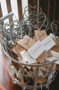 a basket filled with lots of different types of tags