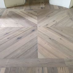 an image of a wood floor that is being installed in the house or office area