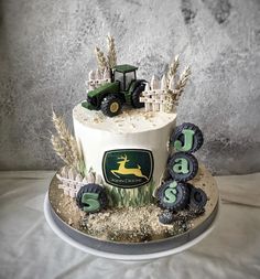 a tractor themed birthday cake on a table