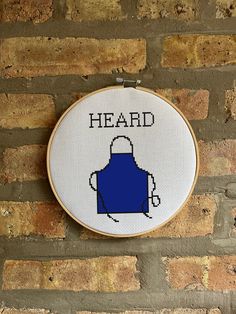 a cross stitch pattern with the words head on it and an image of a coffee cup