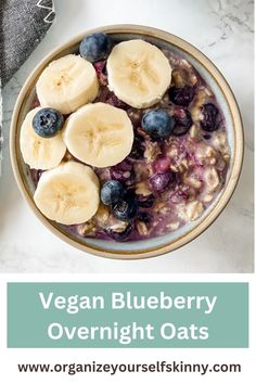 a bowl of oatmeal with blueberries and banana slices on top is shown