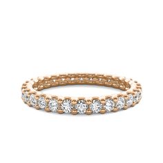 a rose gold band with round diamonds on the inside and outside, set in 18k yellow gold