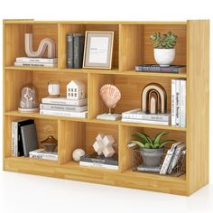 a book shelf with books and other items on it