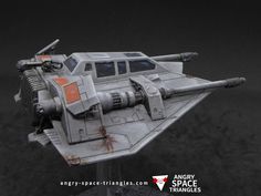 a toy model of a space ship on a black background with the words angry spaces