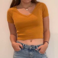 Size Small, Pictured On A Size Small Cute Summer Slightly Cropped Yellowey Brown Tee Casual And Cute, New With Tags, No Flaws. Yellow Stretch V-neck Top, Casual Yellow V-neck Top, Casual Orange V-neck Crop Top, Casual Yellow T-shirt For Fall, Orange Stretch V-neck Top, Stretch Orange V-neck Top, Yellow Stretch Casual T-shirt, Trendy Yellow Stretch T-shirt, Trendy Stretch Yellow T-shirt