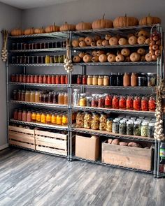 the shelves are filled with many different types of jars