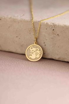 Gold Koala Pendant - Koala Gold Necklace ● Material of pendant: Solid Gold 14k ( REAL GOLD ) ● Metal Stamp: 14k ( REAL GOLD ) ● The pendant is available in 5 sizes: - 12,7 mm / 0.5 inches (Diameter) - 14,0 mm / 0,55 inches ( Diameter ) In the photos - 15,3 mm / 0.6 inches ( Diameter ) - 16,5 mm / 0,65 inches ( Diameter ) - 19,1 mm / 0,75 inches ( Diameter ) ( In the photos the size is 14mm / 0.55 inches Diameter ) ( Jump Ring inner diameter: 4 mm ) ● Material of chain: Solid gold 14k ( REAL GOLD Handmade Yellow Gold Necklaces For Birthdays, White Round Necklace For Gift, White Gold Round Necklace For Birthday, Round Hallmark Charm Necklaces For Gifts, Round Charm Necklaces With Hallmark For Gift, White Engraved Necklace For Birthday Gift, White Engraved Necklace For Gift, Engraved White Necklace For Birthday Gift, White Round Charm Necklace For Birthday