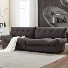 a living room scene with focus on the couch