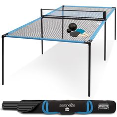 a ping pong table with paddles and balls on it next to a black bag