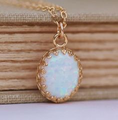 Genuine White Opal NecklaceGold Crown Edge by hangingbyathread1 White Opal Jewelry, White Opal Anniversary Necklace, White Opal Round Pendant Necklace, White Opal Birthstone Jewelry, White Oval Opal Necklace, Dainty White Opal Jewelry, White Opal Necklace For Gift, Delicate White Opal Jewelry, White Ethiopian Opal Gemstone Jewelry