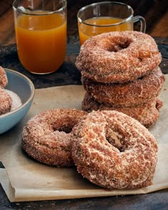 doughnuts and orange juice on a table