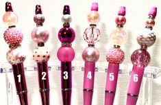 several different types of pens with numbers on them