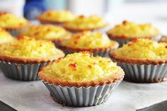 there are many muffins on the tray ready to be eaten