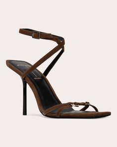 Brought to life in genuine suede, the Frankie sandal elevates its strappy upper with metal ring embellishments across the forefoot. The squared toe and slim stiletto heel reflect architectural inspiration. Buckle closure Metal ring details Squared toe Stiletto heel Upper: 100% kid suede Sock: 100% leather Lining: 100% satin Outsole: 100% leather Heel: 100% ABS Spot clean Handmade in Brazil Size & Fit Heel height: 3.93in (100mm) This item runs slightly small. If you are in-between sizes, we recom Brown Kid, Fashion Moodboard, Buckled Heels, Mood Board Fashion, Stiletto Pumps, Suede Sandals, Architectural Inspiration, Brown Sandals, Metal Ring