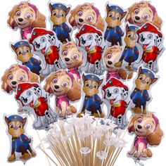 a bunch of cartoon dogs on top of sticks