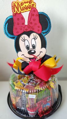 a mickey mouse cake with candy in it