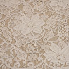 an image of lace with flowers on it