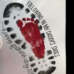 a hand and foot print on a white paper bag with writing that reads, following man's mark street