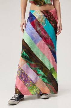 A patchwork of bold prints covers this flowy satin maxi skirt, adding major boho vibes to whatever look you pair it with. 37" length (size 8) Exclusive retailer Hidden side-zip closure 100% polyester Machine wash, line dry Imported Statement Scarf, Satin Maxi Skirt, Print Maxi Skirt, Satin Scarf, Lace Midi Skirt, Patchwork Print, Printed Maxi Skirts, Satin Maxi, Boho Vibe