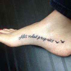 a person with a tattoo on their foot that says, all you want is love