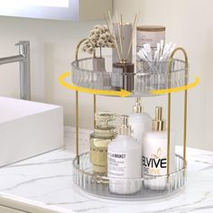 Elevate your bathroom decor with this modern 2-tier organizer, crafted from high-quality PET and sturdy metal. Its stylish design not only meets your daily storage needs but also enhances the aesthetic of your space. Perfect for organizing cosmetics, toiletries, and more, this space-saving solution transforms clutter into elegance. Everly Quinn Finish: Clear | Everly Quinn 360° Rotating 2-Tier Round Makeup Organizer - Space-Saving PET & Metal Vanity Storage w / Polished Finish, Ideal For Cosmetics | 12.01" H X 9.02" W X 9.02" D | Wayfair Makeup Organization Bathroom Counter, Organize Bathroom Counter, Countertop Makeup Organization, Makeup Organization Bathroom, Bathroom Countertop Storage, Profumo Victoria Secret, Rotating Makeup Organizer, Koleksi Parfum, Organize Bathroom Countertop