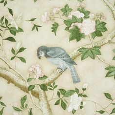 a blue bird sitting on top of a tree branch next to pink and white flowers