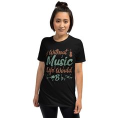 This tee hits all the right notes for musicians and music lovers with its clever pun and eye-catching design! Featuring an elegant blend of musical symbols and instruments like a violin, trumpet, and guitar, it’s a celebration of the universal language of music. The playful "Without Music, Life Would Bb" pun adds just the right touch of humor to keep things lively. Crafted on the Unisex Basic Softstyle Gildan 64000 Shirt, this tee offers unmatched comfort and durability. Its lightweight fabric a Pre-shrunk Black Music-themed T-shirt, Black Music-themed T-shirt With Letter Print, Black Pre-shrunk Music-themed T-shirt, Music-themed Pre-shrunk Black T-shirt, Black Music-themed T-shirt With Text Print, Black Music-themed Shirt With Graphic Print, Music-themed Black Shirt With Graphic Print, Music-themed Black Graphic Print Shirt, Black Music-themed Short Sleeve Shirt